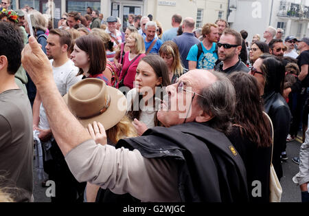 Brighton UK 4th June 2016 - Thousands of people flock to the Kemptown Carnival in Brighton which is one of the largest community events in the city with live bands and dancers performing on 6 stages throughout the afternoon Credit:  Simon Dack/Alamy Live News Stock Photo