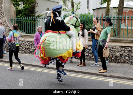 Brighton UK 4th June 2016 - Thousands of people flock to the Kemptown Carnival in Brighton which is one of the largest community events in the city with live bands and dancers performing on 6 stages throughout the afternoon Credit:  Simon Dack/Alamy Live News Stock Photo