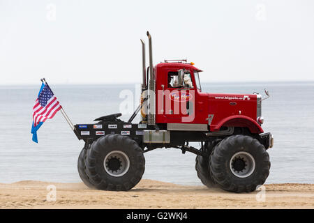 Bournemouth, Dorset UK 4 June 2016. Big Pete monster truck riding along beach on the second day of the Bournemouth Wheels Festival 2016 in June Credit:  Carolyn Jenkins/Alamy Live News. Stock Photo