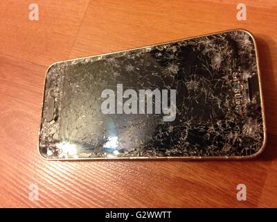 Modern mobile smartphone with broken screen Stock Photo