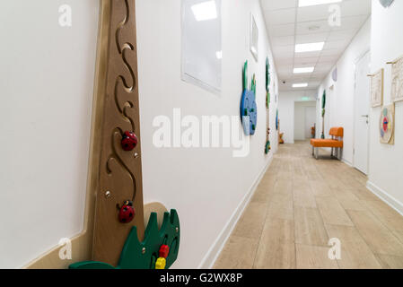 Children's Medical Center with educational games on walls Stock Photo