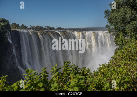 Victoria Falls in full flow seen from Zimbabwe Stock Photo