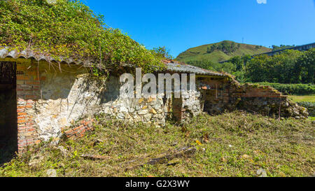 Old abandoned farmhouse in ruins Stock Photo