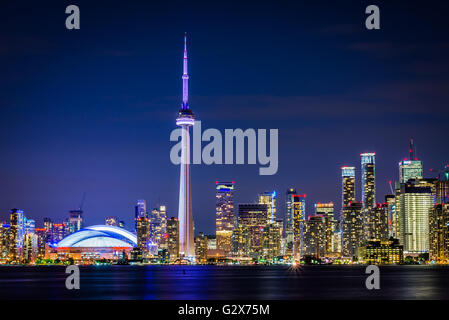 View of the downtown skyline at night, from Centre Island, in Toronto, Ontario. Stock Photo