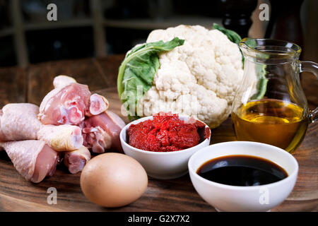 Cauliflower with chicken legs. Cooking. Recipe Stock Photo