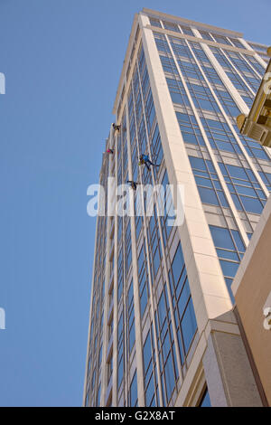 Window washers on a high rise building in Salt lake city Utah. Stock Photo