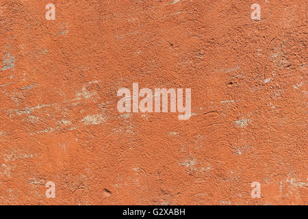 Details of a old concrete wall in orange color Stock Photo