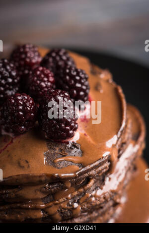Stack of pancakes with fresh blackberries. Shallow depth of field. Stock Photo