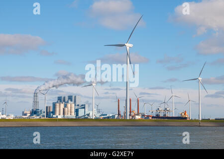 Electrical power generation from fossil fuel coal plant and wind energy at the Eemshaven Seaport in Groningen, Netherlands Stock Photo