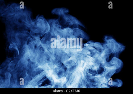 blue smoke on the black background. Stock Photo
