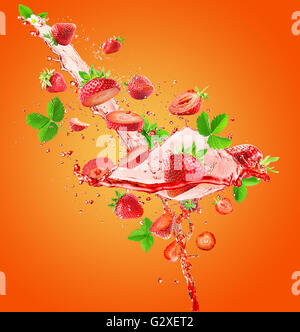 strawberry juice splash on the orange background. Stock Photo