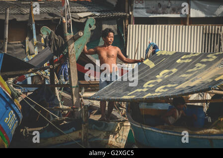 Dock Worker in Jakarta, Indonesia Stock Photo