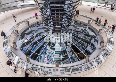 The interior of the glass dome of The Reichstag Building ,which houses the German Bundestag or German Parliament designed by Sir Norman Foster, Berlin Stock Photo