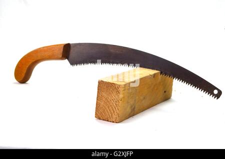 Saw of pruning handle wood Cape Verde Length blade on a white bottom. Stock Photo