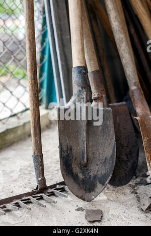 old shovels rakes Tool for working in the garden Stock Photo