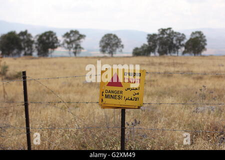 Minefield warning sign in the Golan Heights, Israel. Stock Photo