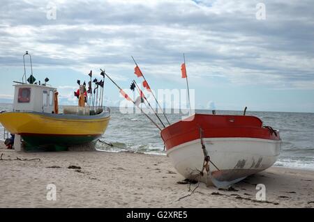 Fishing vessels on beach in Poland. Baltic sea. Stock Photo