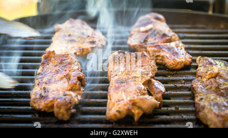 Delicious Australia Day BBQ.  Marinated boneless pieces of Australian lamb  cooked on grill Stock Photo
