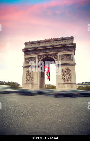 Arc de Triomphe at sunset in Paris, France Stock Photo