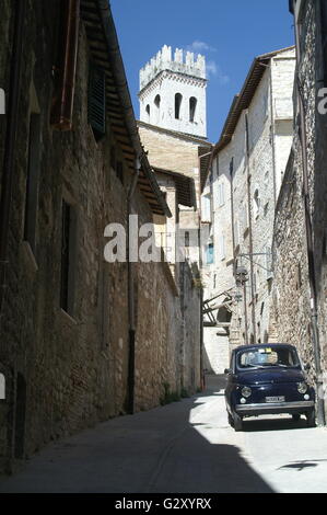 A Blue Fiat 500 parked in an alley- Assisi, Umbria, Italy Stock Photo