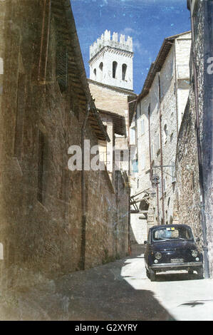 A vintage Fiat 500 in an alley -Assisi, Italy Stock Photo