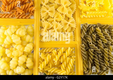 Pasta mix arranged on a stone table Stock Photo