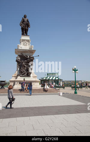 QUEBEC CITY - MAY 23, 2016: The Champlain Monument on Dufferin Terrace pays tribute to the man who founded the city in 1608. Stock Photo