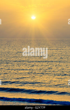 Sunrise over Atlantic ocean Stock Photo