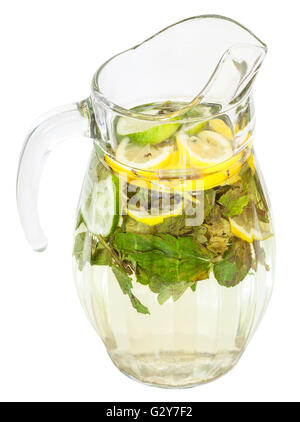 glass pitcher with natural lemonade drink from lemon, lime, mint isolated on white background Stock Photo