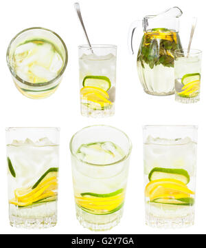 set from glass tumblers with natural lemonade drink from lemon and lime isolated on white background Stock Photo