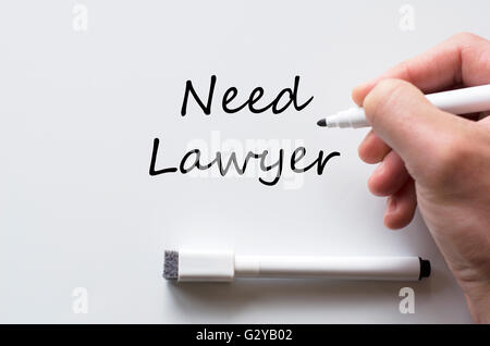 Human hand writing need lawyer on whiteboard Stock Photo