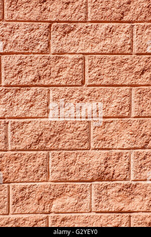 Beige textured rough stone wall for background Stock Photo