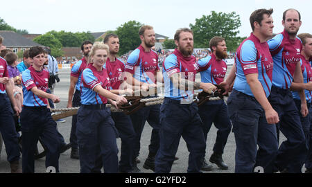 Fareham, Hampshire, UK. 4th June 2016. The most spectacular event took place at HMS Collingwood, Fareham, Hampshire when the establishment opened it gates for the annual Open Day, sponsored by 8 Wealth Management featuring the Royal Navy and Royal Marines Charity (RNRMC) Field Gun Competition. The Field Gun competition featured crews from across the UK and as far afield as Gibraltar competing for the coveted Brickwoods Trophy. Credit:  uknip/Alamy Live News Stock Photo