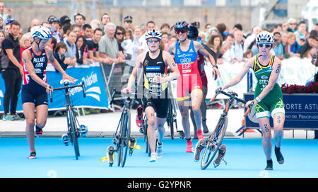 Aviles, Spain. 4th June, 2016. Emma Pallant (Great Britain), Lisa Sieburger (Germany), Margarita Garcia (Spain) and Andrea Steyn (South Africa) prepare to leave the bike and run during the race of women elite & U-23 categories of 2016 Aviles ITU Duathlon World Championships at Center Niemeyer on June 4, 2016 in Aviles, Spain. Credit: David Gato/Alamy Live News Stock Photo