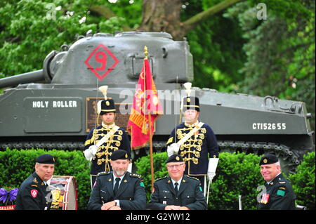 London Ontario Canada, Sunday 05 June 2016.  Past and present members of the Canadian First Hussars march through London and participate in a ceremony to mark the 72nd anniversary of the D-Day landings and the 160th anniversary of the First Hussars. The ceremony was held in Victoria Park near a preserved Sherman Tank which was used by the First Hussars in Europe during the Second World War. Stock Photo