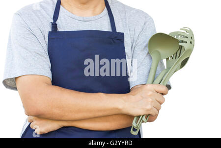 Asian Man Cross Arm With Cooking Tools Stock Photo