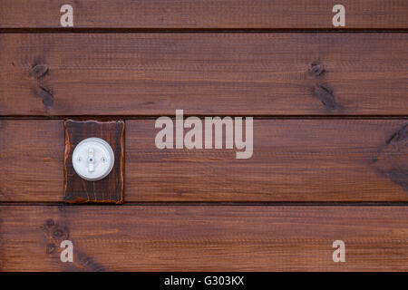 Retro light switch on wooden background Stock Photo