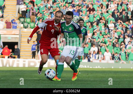 27th May 2016 - Vauxhall International Challenge (Friendly). Northern Ireland 3 Belarus 0. Northern Ireland's Corry Evans (13) and Belarus' Ihar Stasevich challenge for the ball. Stock Photo