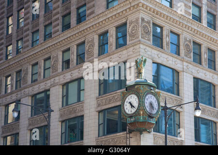 Iconic Father Time clock, the 1926 decorative Jewelers' Building clock in Chicago is emblazoned with the word Time and decorated Stock Photo