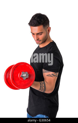 Handsome muscular young man exercises with dumbbells, poses isolated on white Stock Photo