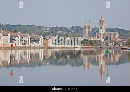 The cathedral of the Blessed Virgin Mary and riverside housing in the Cornish capital reflected in the Truro river at high tide Stock Photo