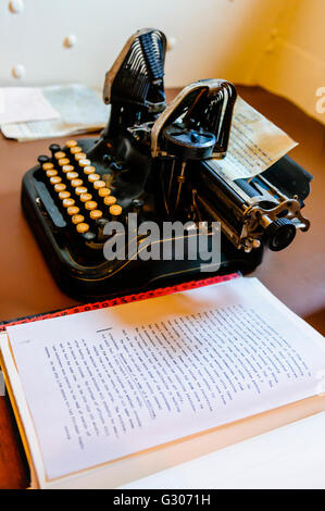 Old office desk and Oliver Model 9 typewriter from early 1900s. Stock Photo