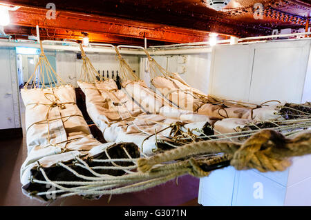 Crew member's hammocks on HMS Caroline, Belfast, the last surviving ship from the Battle of Jutland. Stock Photo