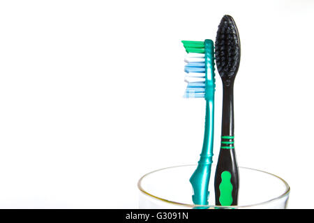Two tooth brushes, closeup isolated on white Stock Photo