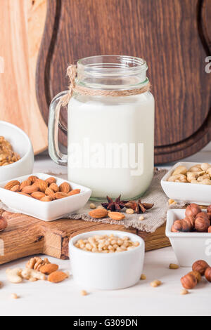 Vegan milk from nuts in glass jar Stock Photo