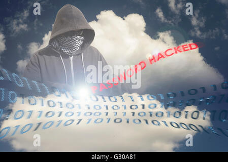 Hacker with a hidden face breaks into a cloud computing mainframe in the sky. Copy space area for internet security Stock Photo