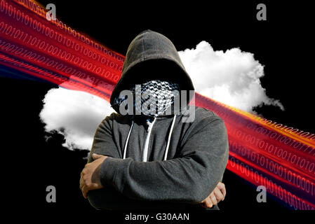 Hooded and masked computer hacker thief with a cloud computer based background. Unknown technology threat to the cloud mainframe Stock Photo