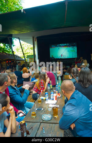 People watching ice hockey world championships, Riegrovy sady, beer garden, Vinohrady, Prague, Czech Republic Stock Photo