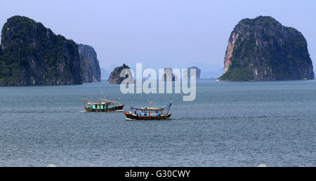Vietnamese fishing boat in Ha Long Bay, South China Sea Stock Photo