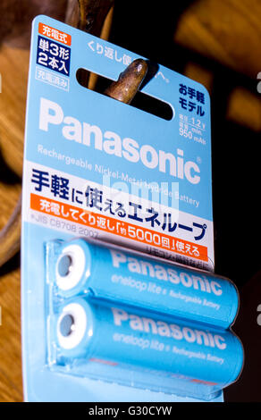 PANASONIC AA Eneloop alkaline battery on a white background. Panasonic Corporation, (Matsushita Electric Industrial Co., Ltd.). Stock Photo